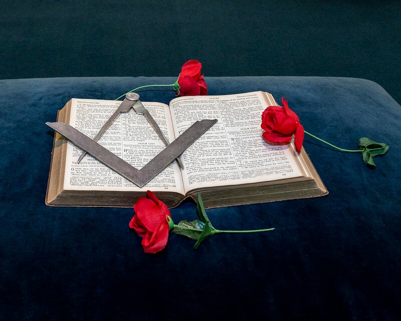 Holy Bible on a Masonic Alter with Roses